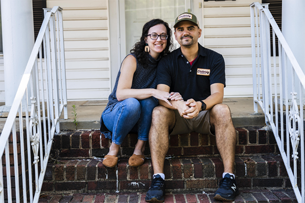 Image of Becky and Tony Santoro sitting on porch